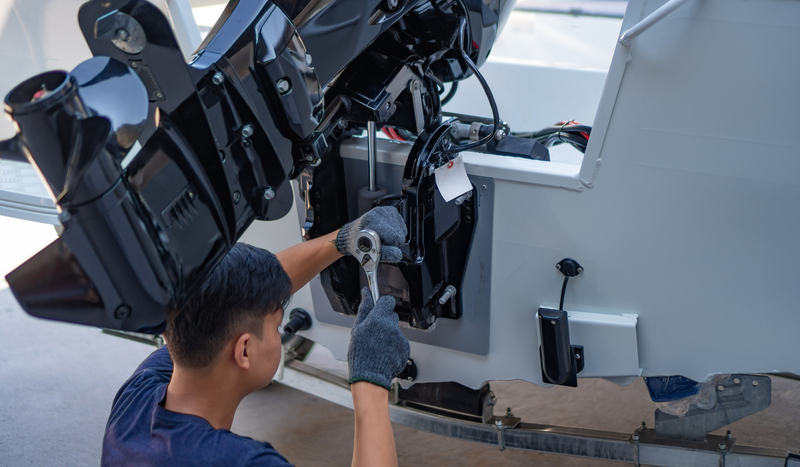 Man fixing marine shaft mount